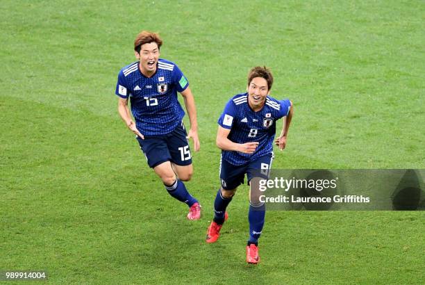 Genki Haraguchi of Japan celebrates after scoring his team's first goal during the 2018 FIFA World Cup Russia Round of 16 match between Belgium and...