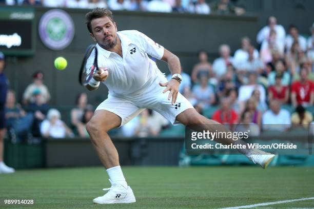 Stan Wawrinka v Grigor Dimitrov - Stan Wawrinka stretches for the ball at All England Lawn Tennis and Croquet Club on July 2, 2018 in London, England.