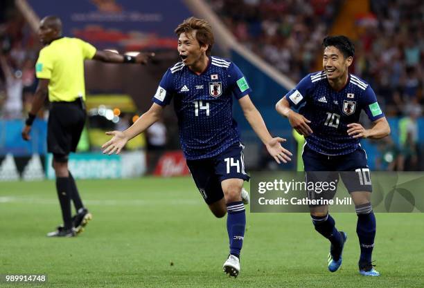 Takashi Inui of Japan celebrates after scoring his team's second goal during the 2018 FIFA World Cup Russia Round of 16 match between Belgium and...