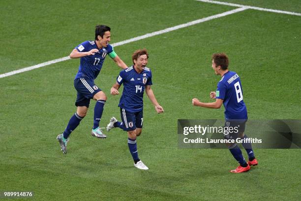 Takashi Inui of Japan celebrates after scoring his team's second goal during the 2018 FIFA World Cup Russia Round of 16 match between Belgium and...