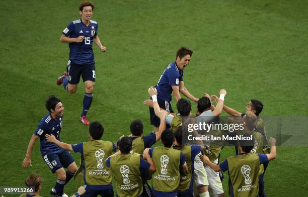 Genki Haraguchi of Japan celebrates scoring his team's opening goal during the 2018 FIFA World Cup Russia Round of 16 match between Belgium and Japan...