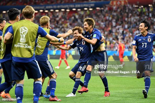 Takashi Inui of Japan celebrates with teammates after scoring his team's second goal during the 2018 FIFA World Cup Russia Round of 16 match between...