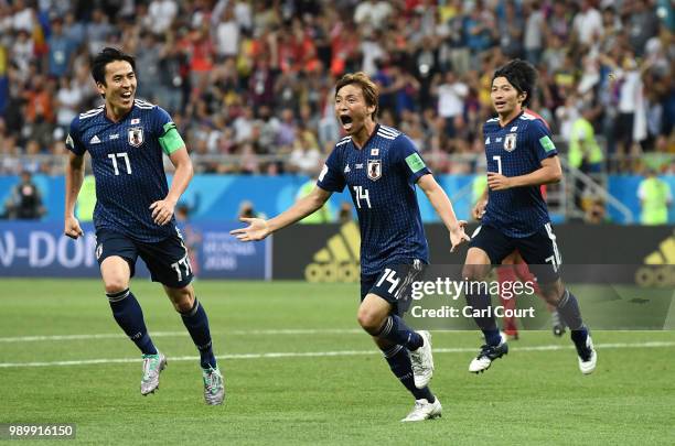 Takashi Inui of Japan celebrates after scoring his team's second goal during the 2018 FIFA World Cup Russia Round of 16 match between Belgium and...