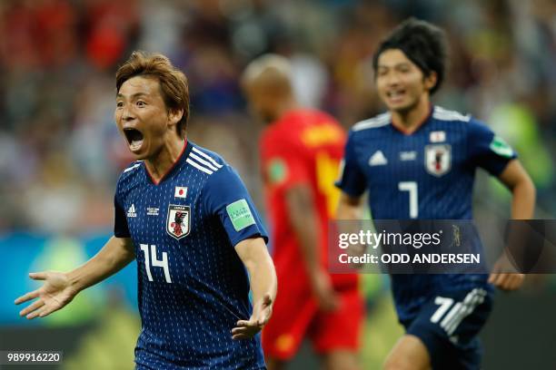 Japan's midfielder Takashi Inui celebrates after scoring during the Russia 2018 World Cup round of 16 football match between Belgium and Japan at the...