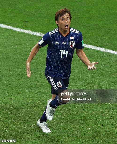 Takashi Inui of Japan celebrates after scores his sides second goal during the 2018 FIFA World Cup Russia Round of 16 match between Belgium and Japan...