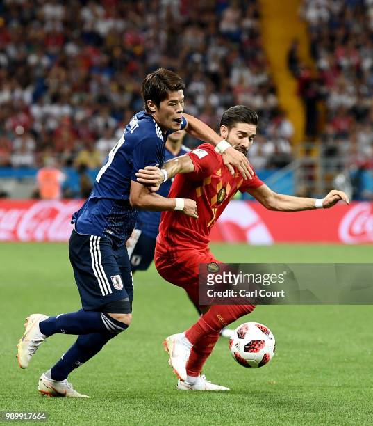 Hiroki Sakai of Japan tackles Yannick Carrasco of Belgium during the 2018 FIFA World Cup Russia Round of 16 match between Belgium and Japan at Rostov...