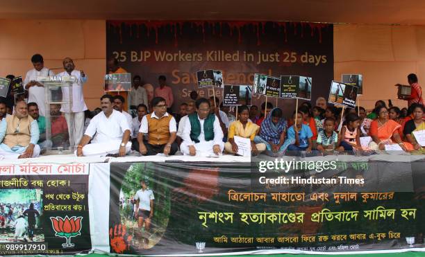 Activists protests against killing of party workers in West Bengal at Rajghat on July 2, 2018 in New Delhi, India. Two BJP activists 35-year-old...