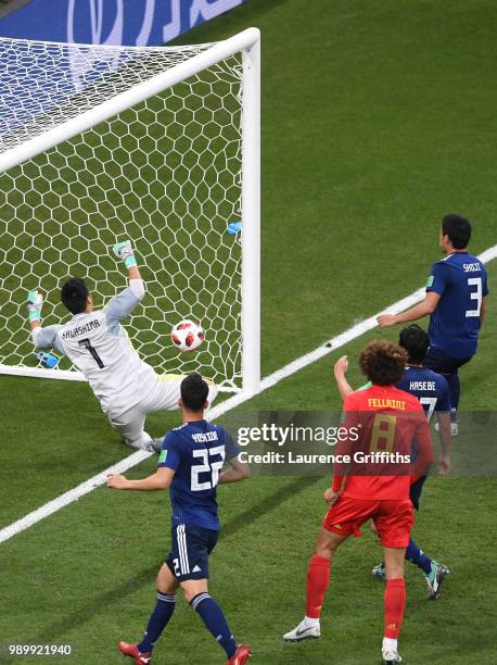 Goalkeeper Eiji Kawashima of Japan is beaten by a header from Jan Vertonghen of Belgium for Belgium's opening goal during the 2018 FIFA World Cup...