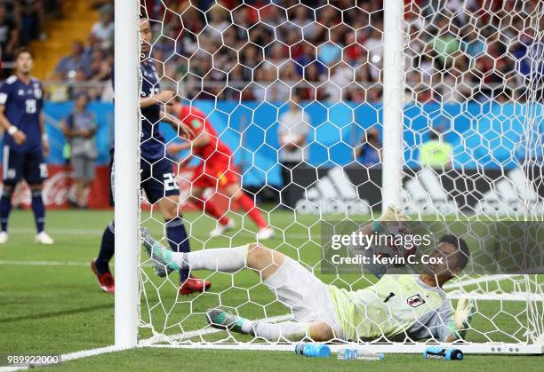 Goalkeeper Eiji Kawashima of Japan is beaten by a header from Jan Vertonghen of Belgium for Belgium's opening goal during the 2018 FIFA World Cup...