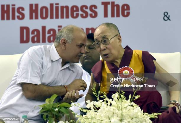 Deputy Chief Minister & Education Minister Manish Sisodia speaks with His Holiness Dalai Lama during the inauguration of Happiness Curriculum of the...