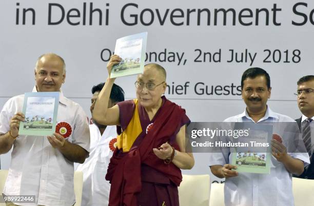 His Holiness Dalai Lama , Chief Minister of Delhi Arvind Kejriwal and Deputy Chief Minister & Education Minister Manish Sisodia during the launch of...