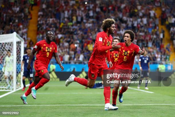 Marouane Fellaini of Belgium celebrates with team mates Axel Witsel and Romelu Lukaku after scoring his team's second goal during the 2018 FIFA World...