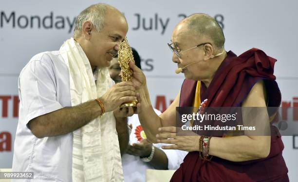 His Holiness Dalai Lama presents a memento to Deputy Chief Minister & Education Minister Manish Sisodia after the inauguration of Happiness...