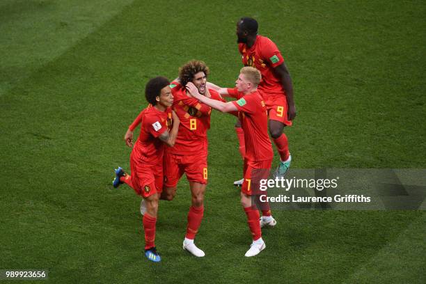 Marouane Fellaini of Belgium celebrates with team mates after scoring his team's second goal during the 2018 FIFA World Cup Russia Round of 16 match...