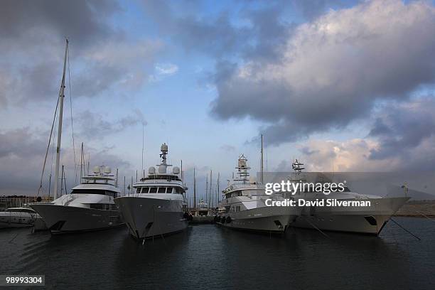 EcoOcean's marine research vessel Mediterranean Explorer passes luxury yachts on its way to the eastern Mediterranean Sea to gather water samples at...