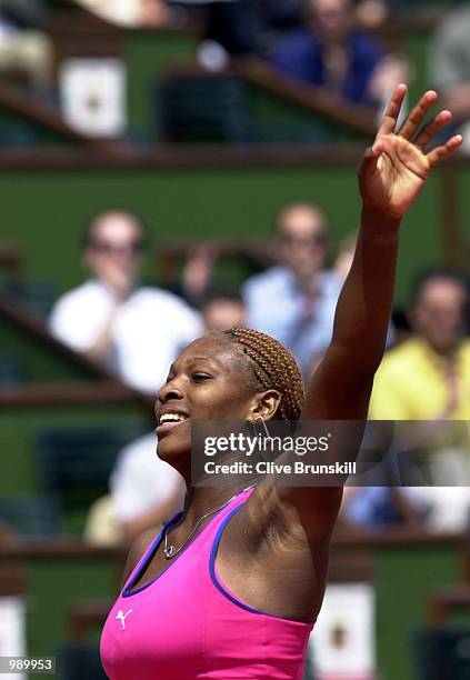 Serena Williams of the USA celebrates after winning her second round match against Katarina Srebotnik of Slovakia during the French Open Tennis at...