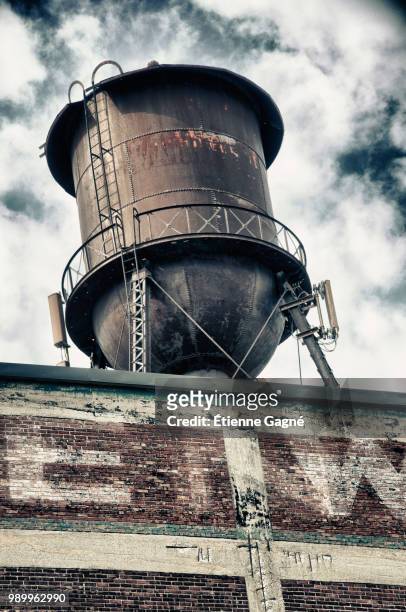 photo by: étienne gagné - water tower storage tank - fotografias e filmes do acervo