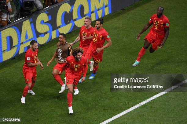 Marouane Fellaini of Belgium celebrates with team mates after scoring his team's second goal during the 2018 FIFA World Cup Russia Round of 16 match...
