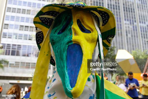 Brazil fans gather at the FIFA Fan Fest set up in the Anhangabaú Valley, downtown São Paulo, to follow the Brazil-Mexico national team in Samara for...