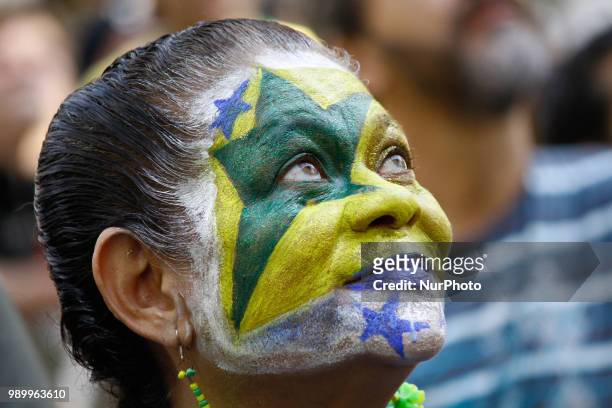 Brazil fans gather at the FIFA Fan Fest set up in the Anhangabaú Valley, downtown São Paulo, to follow the Brazil-Mexico national team in Samara for...