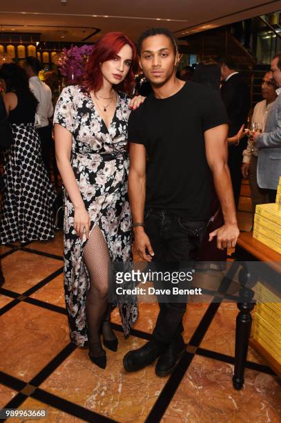 Nikita Andrianova and Bluey Robinson attend the TWG Tea Gala Event in Leicester Square to celebrate the launch of TWG Tea in the UK on July 2, 2018...