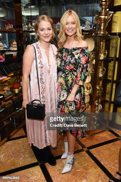 Poppy Jamie and Laura Whitmore attend the TWG Tea Gala Event in Leicester Square to celebrate the launch of TWG Tea in the UK on July 2, 2018 in...