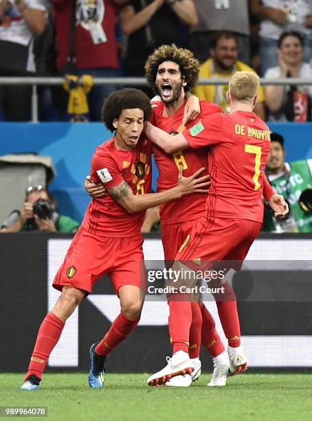 Marouane Fellaini of Belgium celebrates with team mates Axel Witsel and Kevin De Bruyne after scoring his team's second goal during the 2018 FIFA...