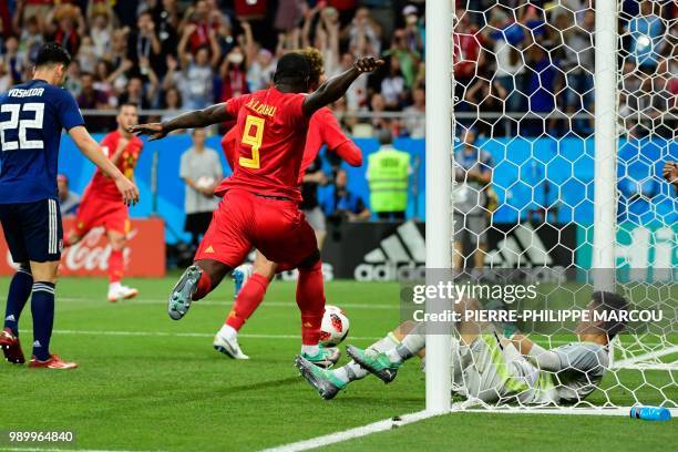 Belgium's forward Romelu Lukaku and Belgium's midfielder Marouane Fellaini reacts after their team's second goal during the Russia 2018 World Cup...