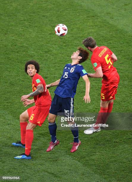 Jan Vertonghen of Belgium wins a header over Yuya Osako of Japan during the 2018 FIFA World Cup Russia Round of 16 match between Belgium and Japan at...