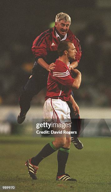 Matt Dawson of the British and Irish Lions is set upon by Pat O''Keefe after kicking the conversion that won the match for the Lions in the match...