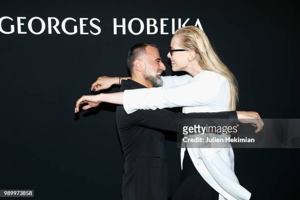 Designer Georges Hobeika poses with Tatiana Dyagileva after the final of the George Hobeika Haute Couture Fall Winter 2018/2019 show as part of Paris...