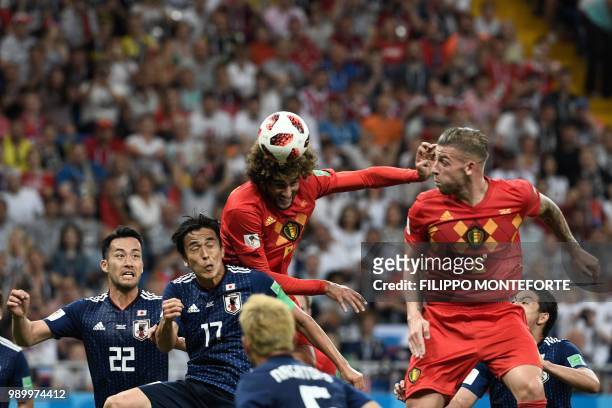 Belgium's midfielder Marouane Fellaini heads to score the equaliser during the Russia 2018 World Cup round of 16 football match between Belgium and...