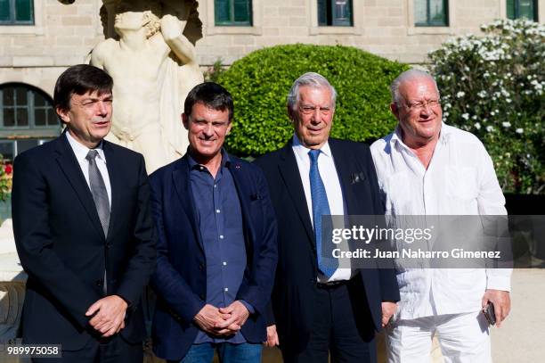 Carlos Andradas, Manuel Valls, Mario Vargas Llosa and Juan Jose Armas Marcelo attend El Escorial Summer Courses 2018 at Real Centro Universitario...