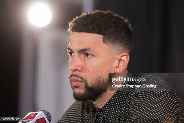 Austin Rivers of the Washington Wizards talks to the media during a press conference at Capital One Arena in Washington, DC on July 2, 2018. NOTE TO...