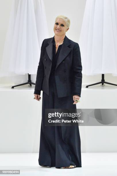 Fashion designer Maria Grazia Chiuri acknowledges the audience during the Christian Dior Haute Couture Fall Winter 2018/2019 show as part of Paris...