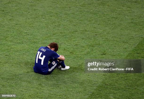 Takashi Inui of Japan looks dejected following his sides defeat in the 2018 FIFA World Cup Russia Round of 16 match between Belgium and Japan at...