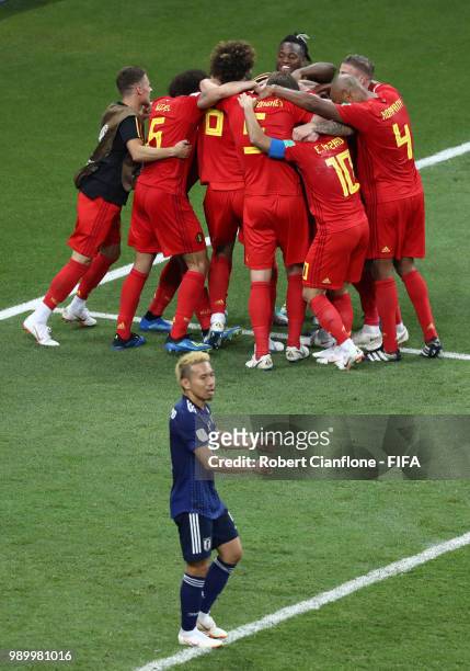 Nacer Chadli of Belgium celebrates with teammates after scoring his team's third goal during the 2018 FIFA World Cup Russia Round of 16 match between...