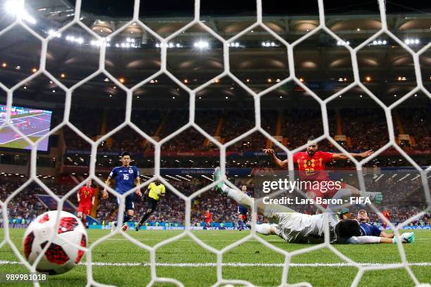 Nacer Chadli of Belgium scores past Eiji Kawashima of Japan his team's third goal during the 2018 FIFA World Cup Russia Round of 16 match between...