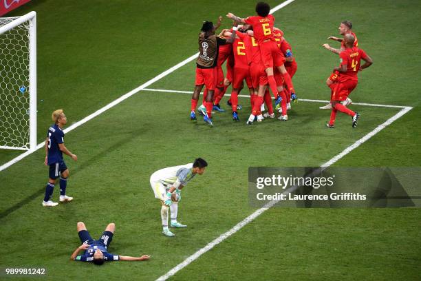 Nacer Chadli of Belgium celebrates after scoring his team's third goal with team mates during the 2018 FIFA World Cup Russia Round of 16 match...