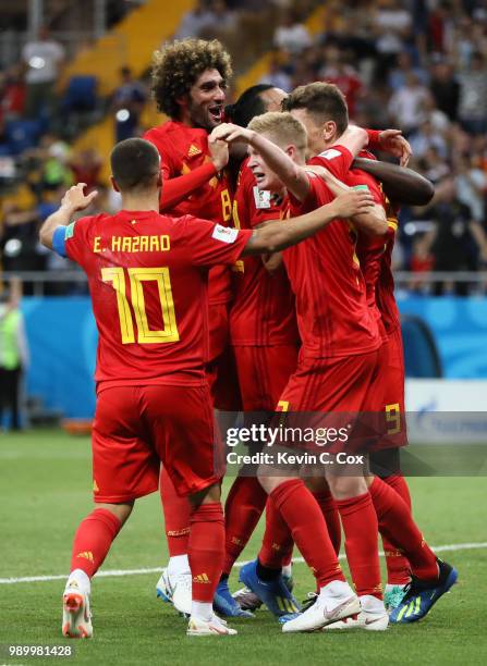 Nacer Chadli of Belgium celebrates after scoring his team's third goal with team mates during the 2018 FIFA World Cup Russia Round of 16 match...