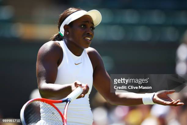 Sloane Stephens of the United States reacts during her Ladies' Singles first round match against Donna Vekic of Croatia on day one of the Wimbledon...