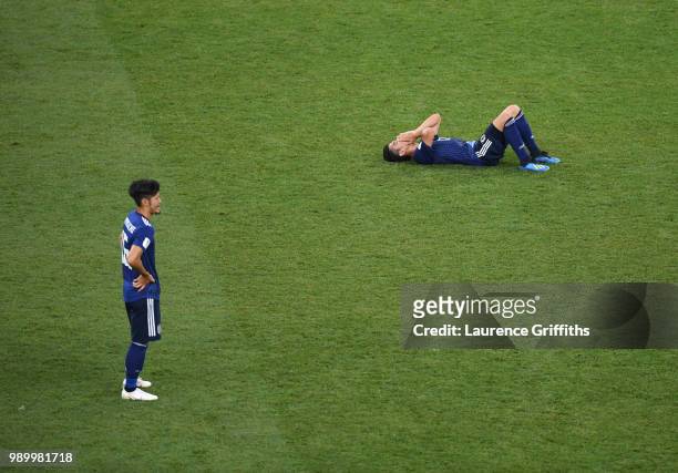 Shinji Kagawa of Japan looks dejected following his sides defeat in the 2018 FIFA World Cup Russia Round of 16 match between Belgium and Japan at...
