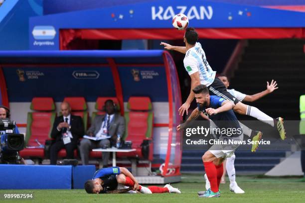 Federico Fazio of Argentina jumps to head the ball during the 2018 FIFA World Cup Russia Round of 16 match between France and Argentina at Kazan...