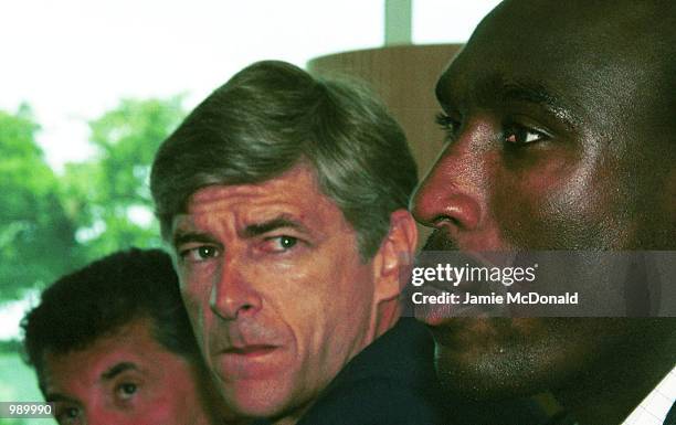 Sol Campbell and manager Arsene Wenger during a press conference at Arsenals training ground, London Colney, to announce his signing for Arsenal...