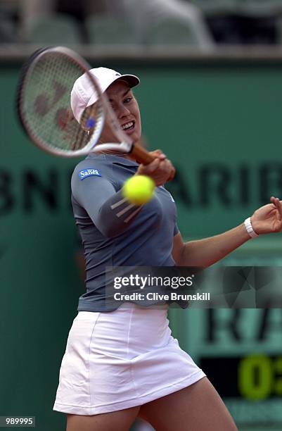 Martina Hingis of Switzerland returns in her second round match against Catalina Castano of Columbia during the French Open Tennis at Roland Garros,...