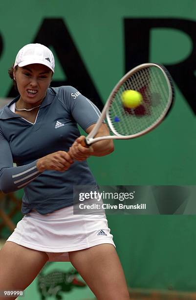 Martina Hingis of Switzerland returns in her second round match against Catalina Castano of Columbia during the French Open Tennis at Roland Garros,...
