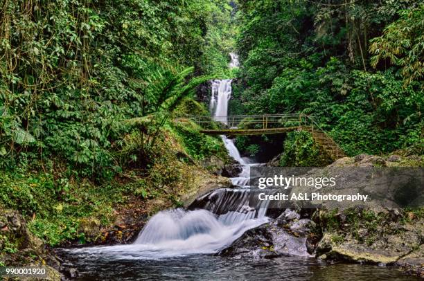 waterfall with slow shutter speed - slow shutter stock pictures, royalty-free photos & images