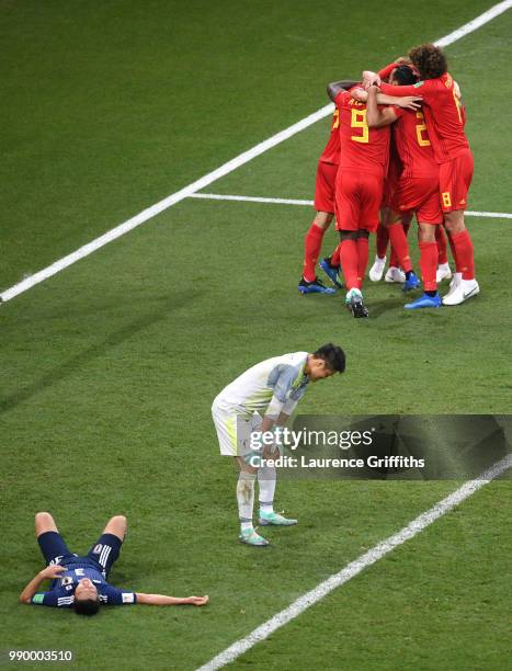 Nacer Chadli of Belgium celebrates after scoring his team's third goal with team mates during the 2018 FIFA World Cup Russia Round of 16 match...