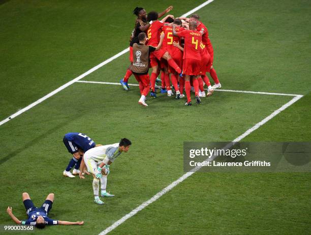 Nacer Chadli of Belgium celebrates after scoring his team's third goal with team mates during the 2018 FIFA World Cup Russia Round of 16 match...