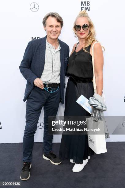 Wolfgang Bahro and Eva Mona Rodekirchen attend the Guido Maria Kretschmer show during the Berlin Fashion Week Spring/Summer 2019 at ewerk on July 2,...